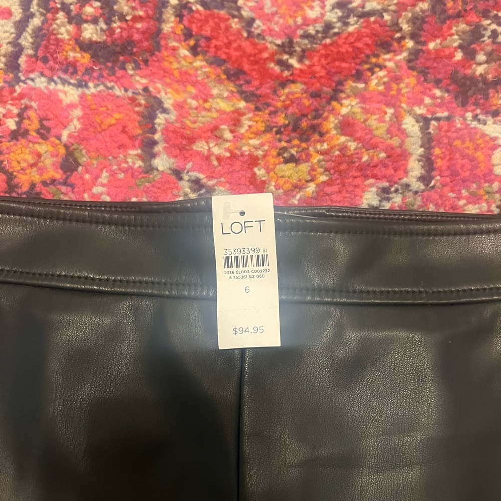 Loft black leather skirt with pockets front slit size 6 back zip.